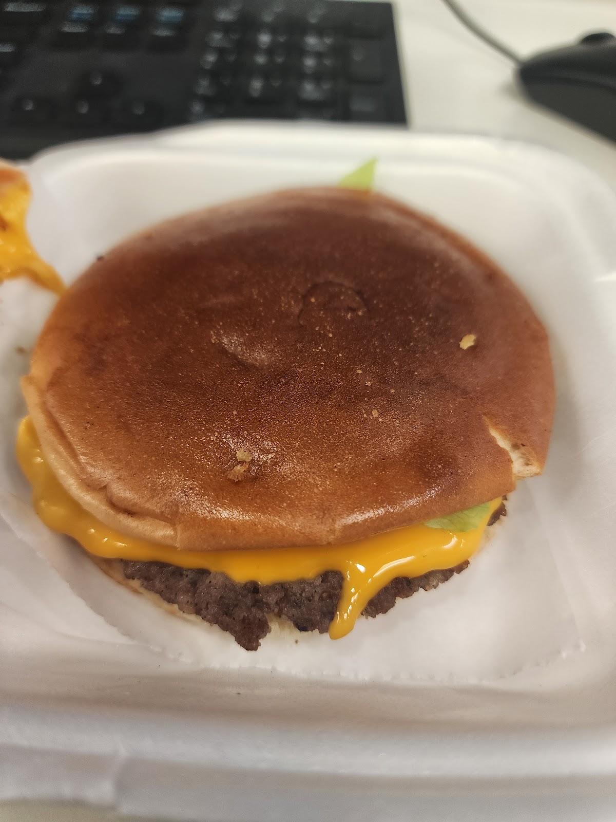 The Abou Afif cheeseburger in its takeaway box
