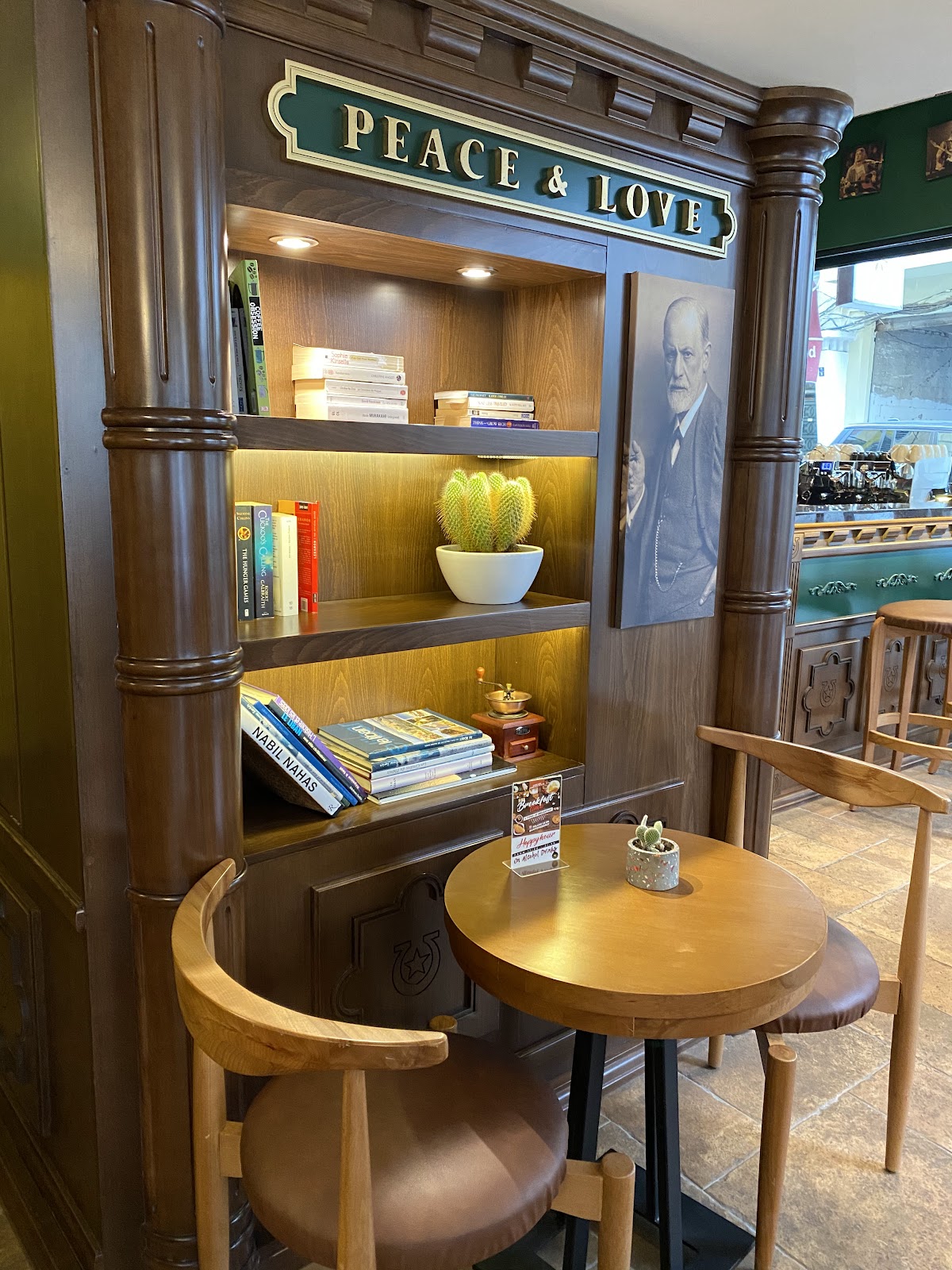 The Peace and Love shelf and reading corner inside the shop