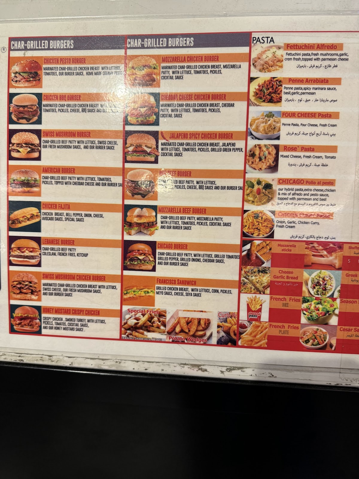 The photo menu board on the shop wall