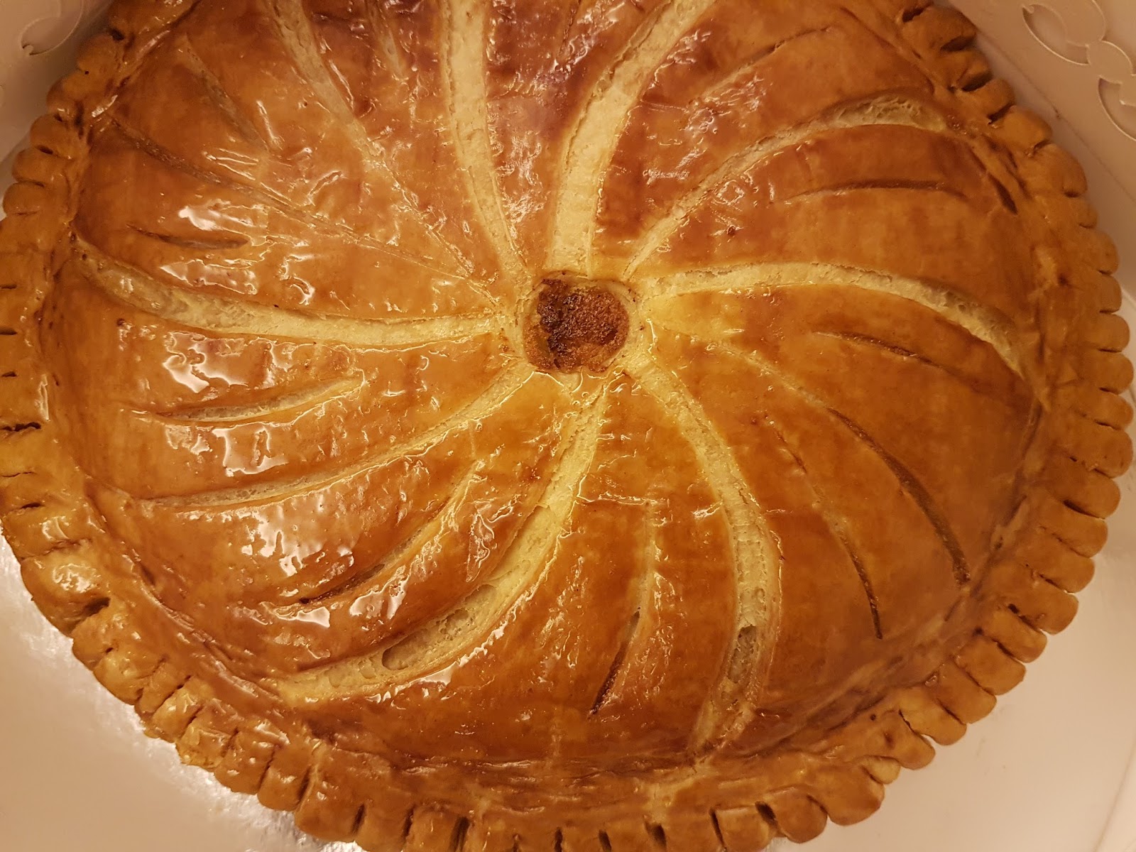 A golden galette baked in the Emotions kitchen, seen from above