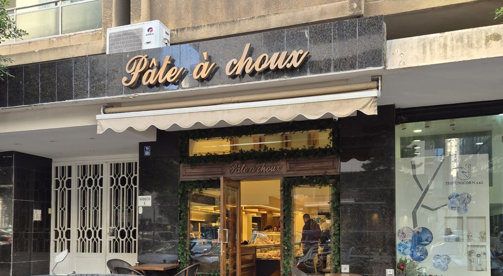 The Pâte à Choux storefront and awning at Sodeco