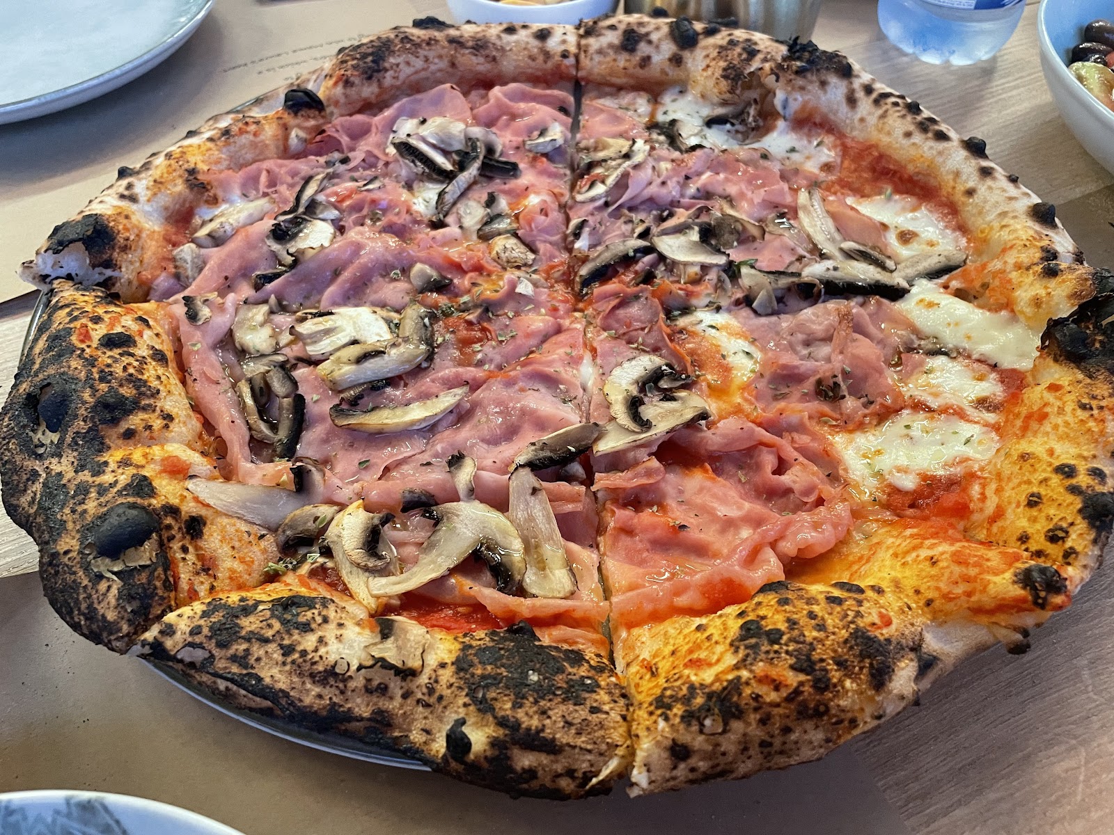 A blistered-crust Pertutti pizza straight out of the oven