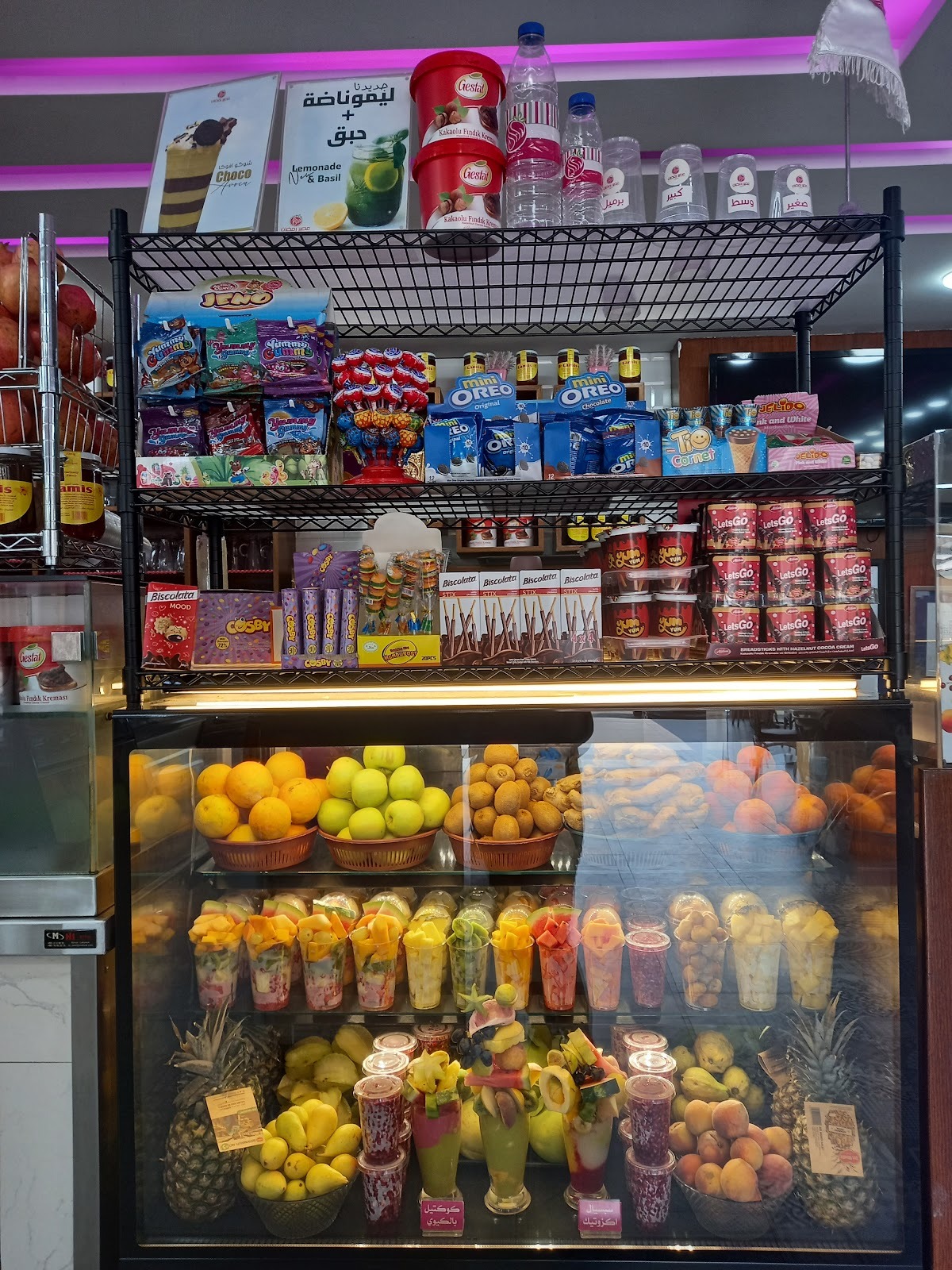 The Ramadan Juice fruit wall and the fridge stocked with ready cups