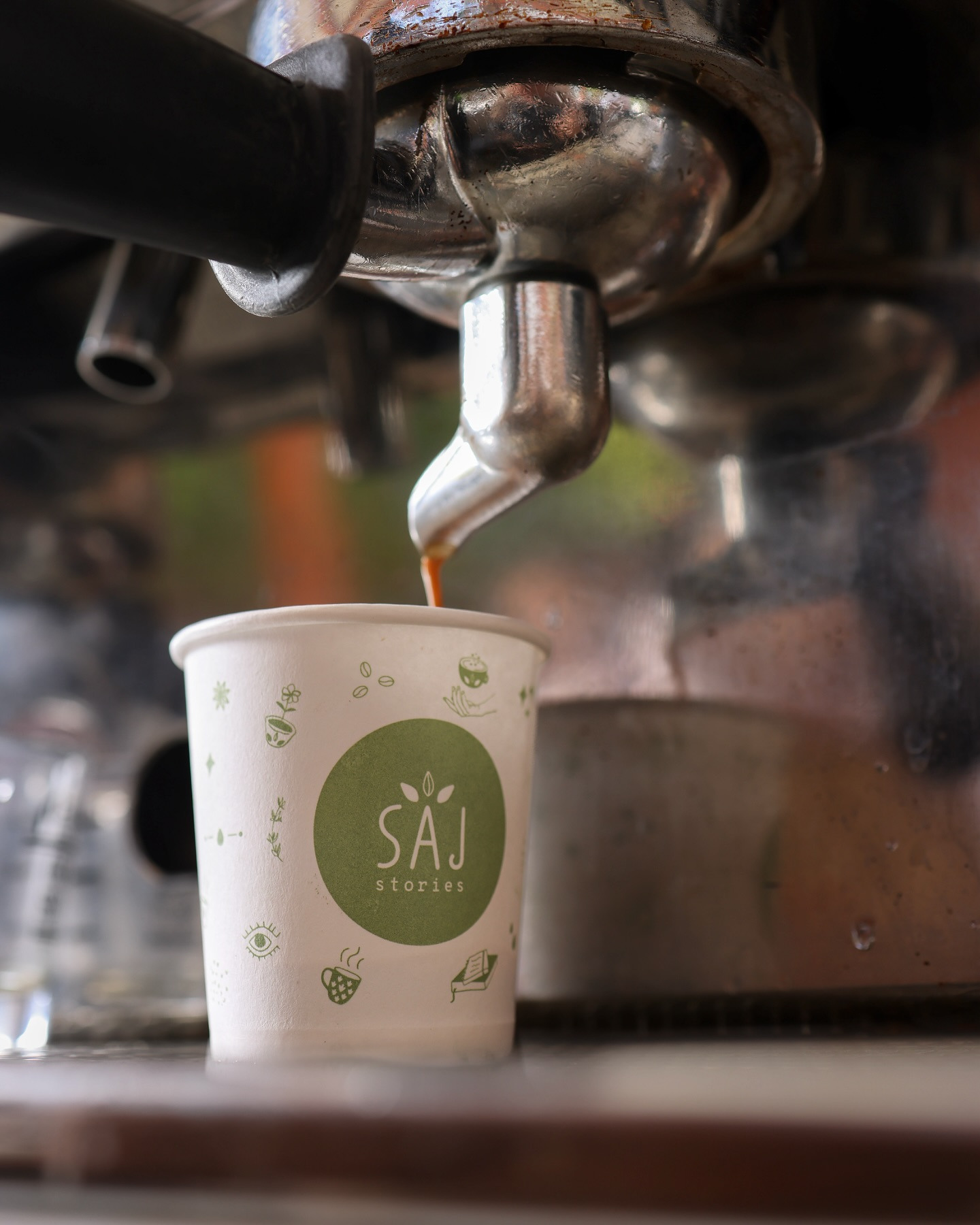 Espresso running into a Saj Stories cup