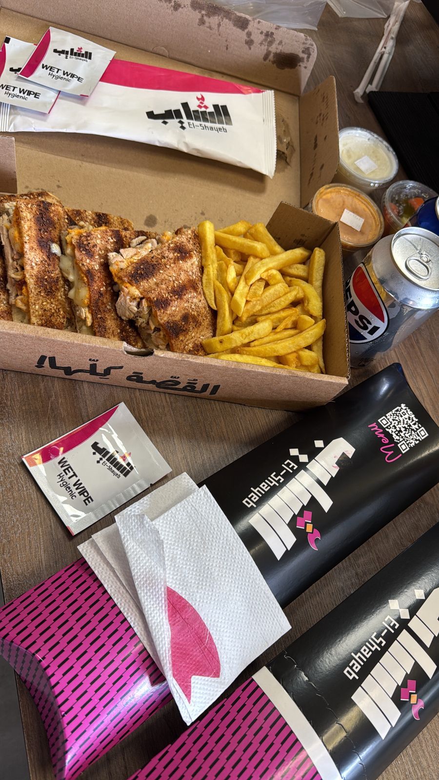 Wrapped sandwiches and boxed order ready for delivery