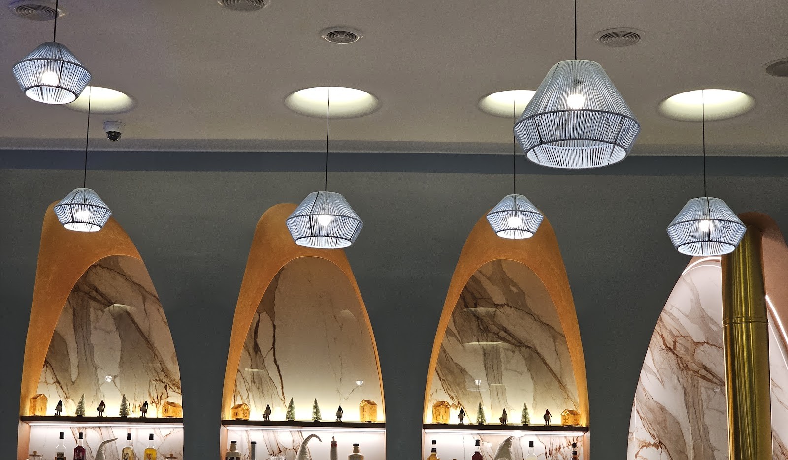 Pendant lamps over the terracotta arches inside Soul Beirut
