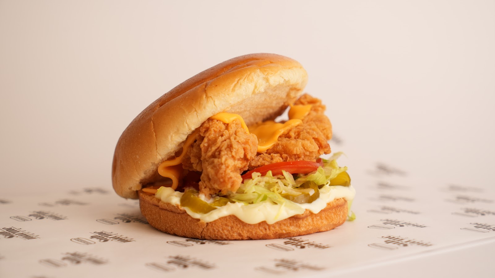 Crispy chicken burger with lettuce and pickles