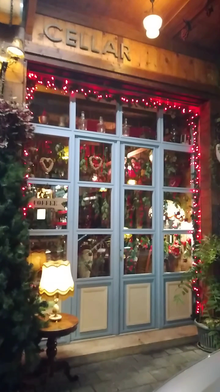 The cellar door at night dressed in red lights