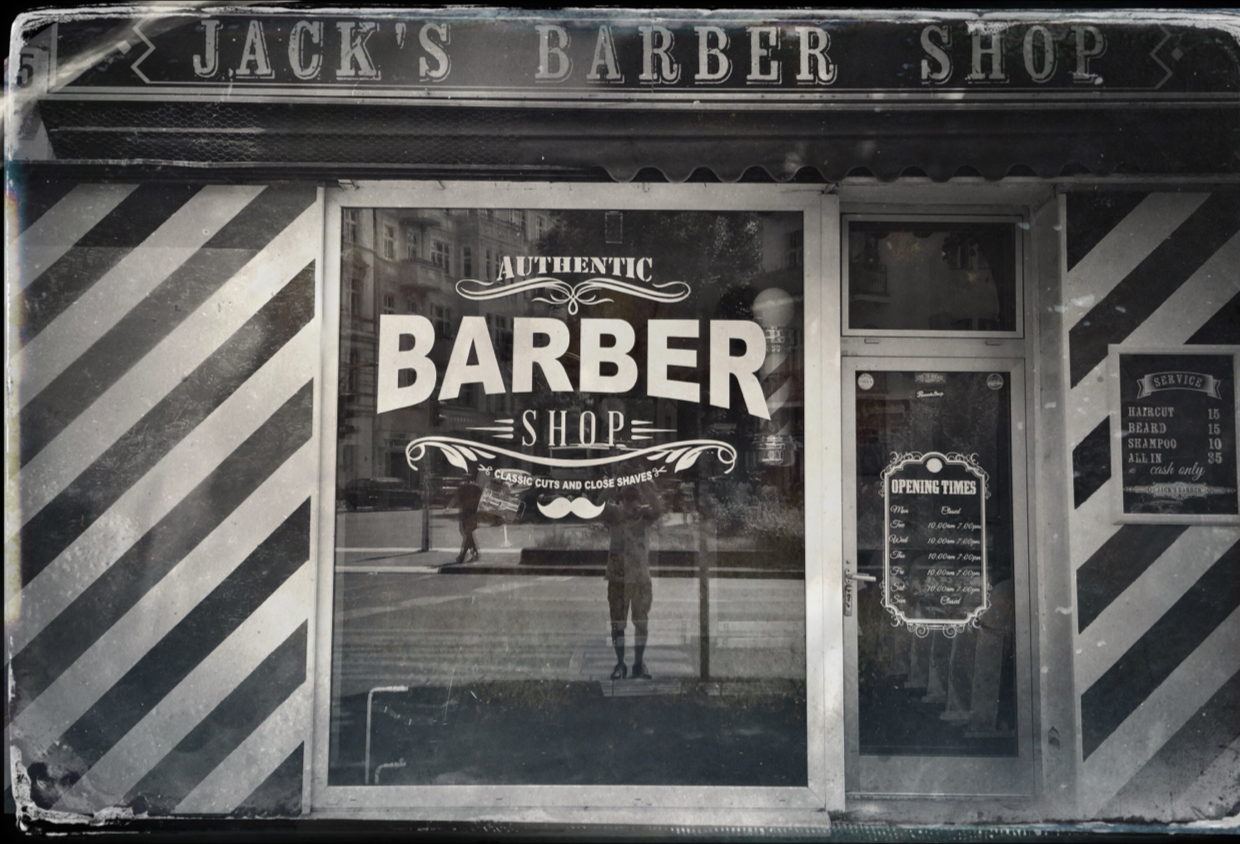 Authentic Barber Shop Schriftzug im Schaufenster